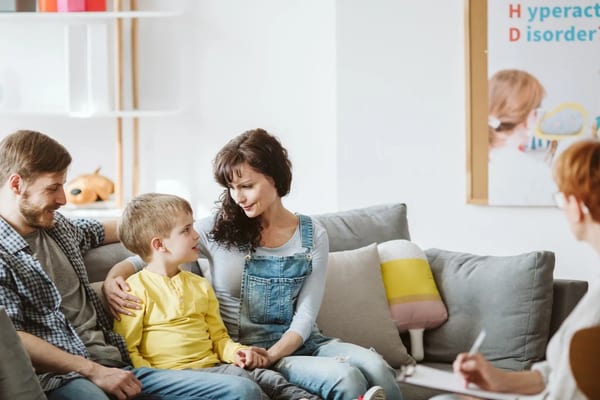Family therapy session with counselor